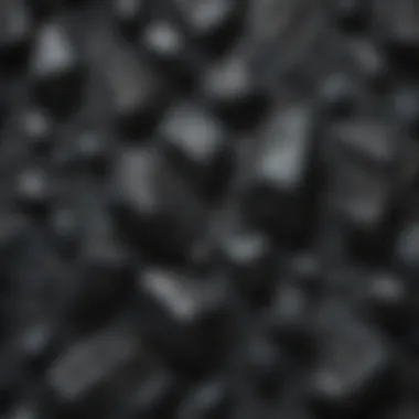 Close-up of black obsidian rock revealing intricate patterns