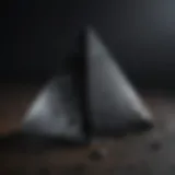 Striking black obsidian pyramid showcasing its lustrous surface