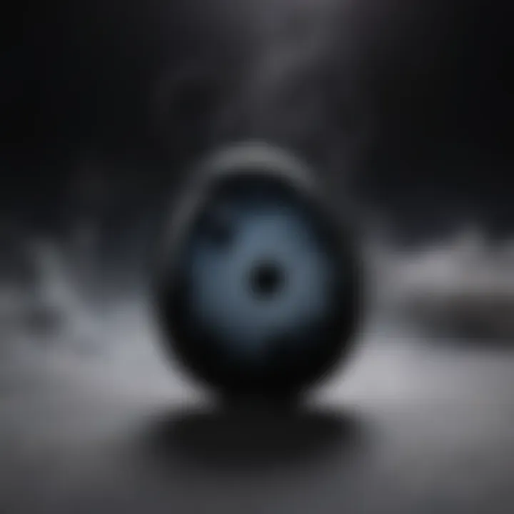 Black obsidian worry stone being held against a backdrop of ethereal smoke and faint moonlight