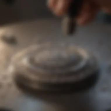 Close-up of Dremel tool polishing jewelry surface