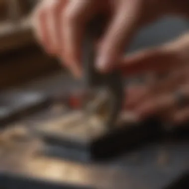 Craftsman using jeweler's saw for delicate jewelry piece