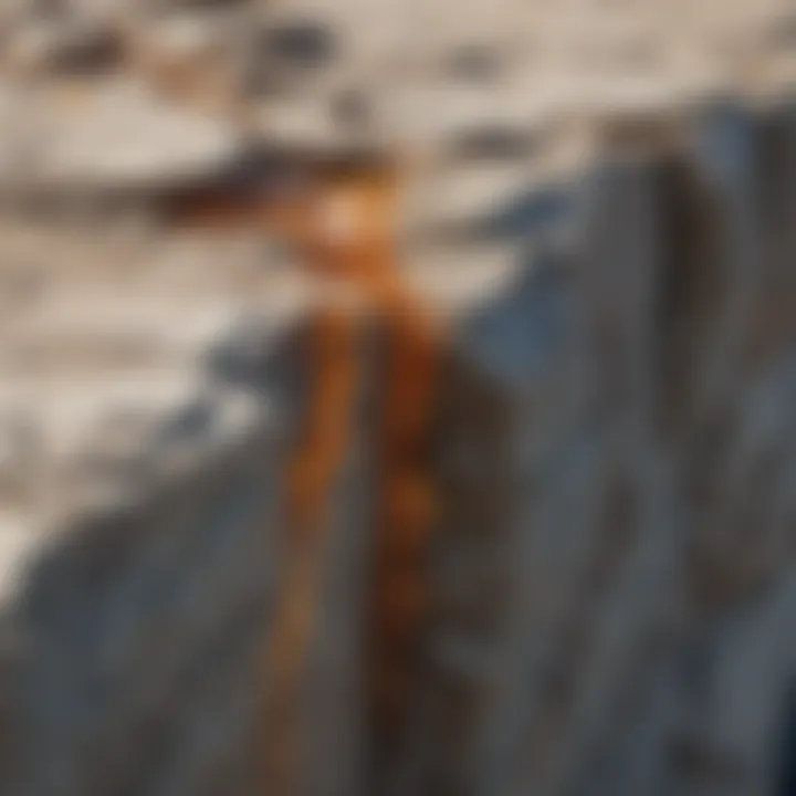 A detailed close-up of adhesive application on a fractured rock surface