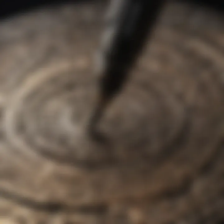 Dremel tool with cutting attachment creating intricate design