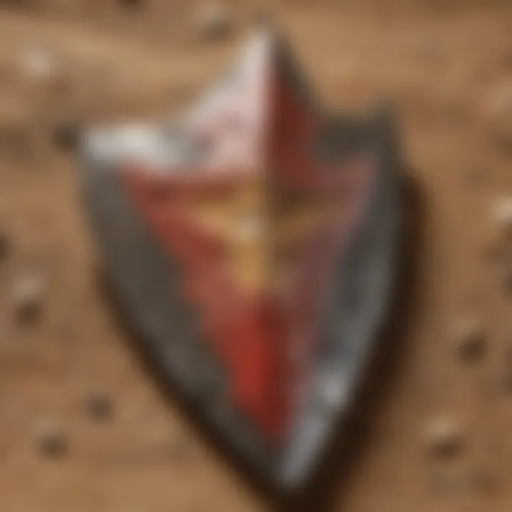 A close-up of an arrowhead with clear signs of wear, emphasizing the importance of condition.
