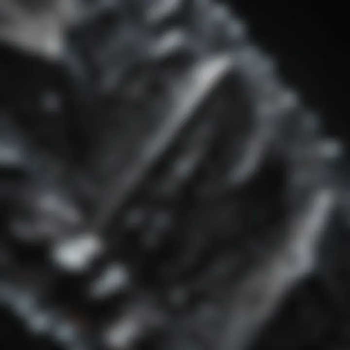 Close-up of obsidian showcasing its glassy texture and sharp edges