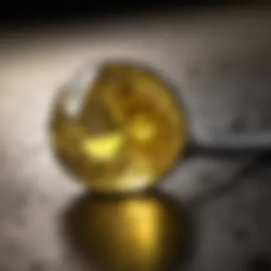 Examining the Unique Qualities of a Greenish Yellow Gemstone Detailed examination of a greenish yellow gemstone under a jeweler's loupe, revealing its unique characteristics.