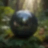 Mystical hematite sphere resting on natural foliage