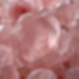 A close-up view of natural rose quartz showcasing its delicate pink hue and unique crystal formations