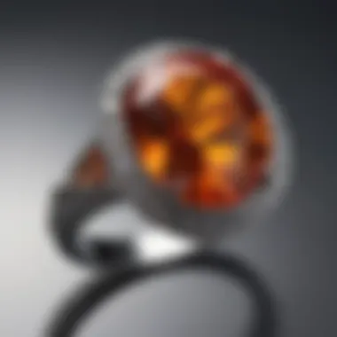 A beautifully polished orange sapphire set in a luxurious ring.