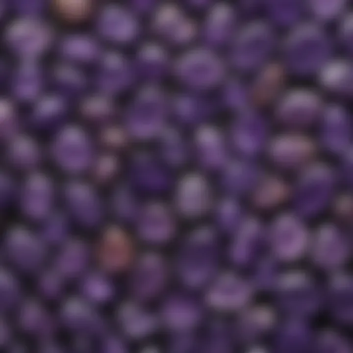 An aesthetic display of various amethyst worry stones, showcasing their unique shapes and sizes
