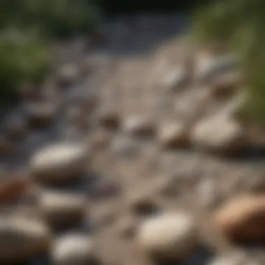 An artistic arrangement of smooth river rocks used in landscaping, highlighting their aesthetic appeal.