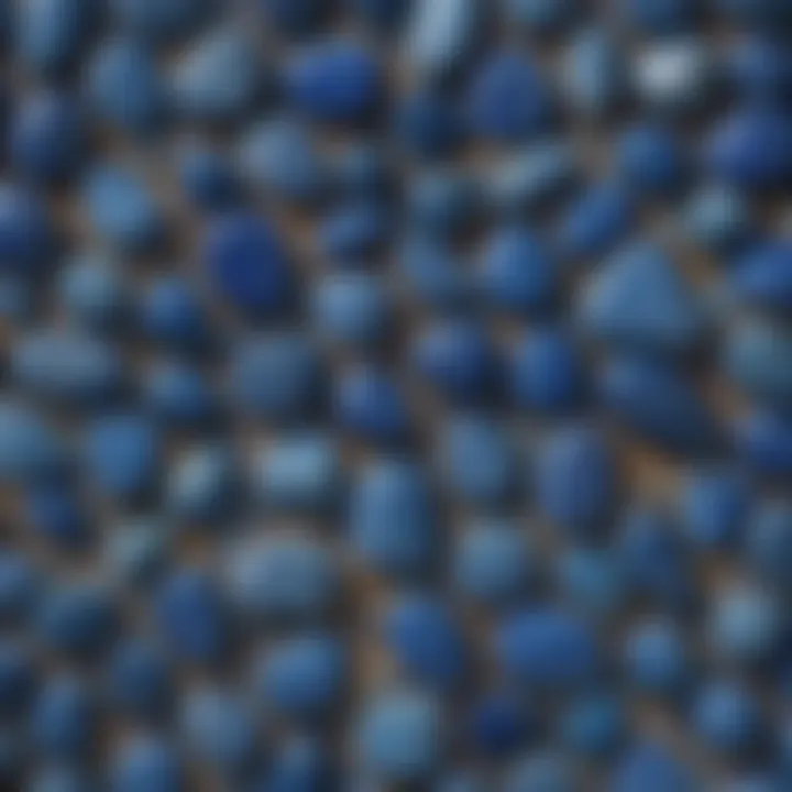 An array of various blue stones including lapis lazuli and aquamarine displayed artistically
