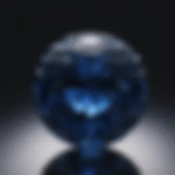 A stunning deep blue sapphire with intricate facets reflecting light