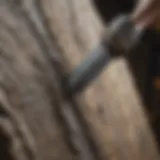 A close-up view of a traditional stone chisel showcasing its sharpened edge and craftsmanship.
