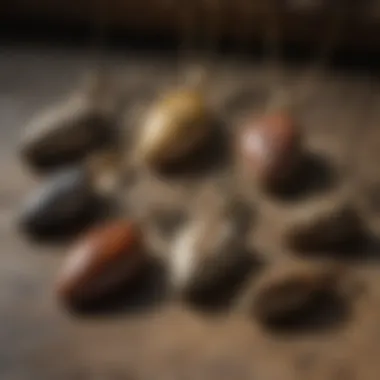 A collection of dinosaur bone pendants displayed against a natural backdrop.