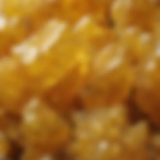 Close-up view of a vibrant yellow mineral specimen showcasing its crystalline structure