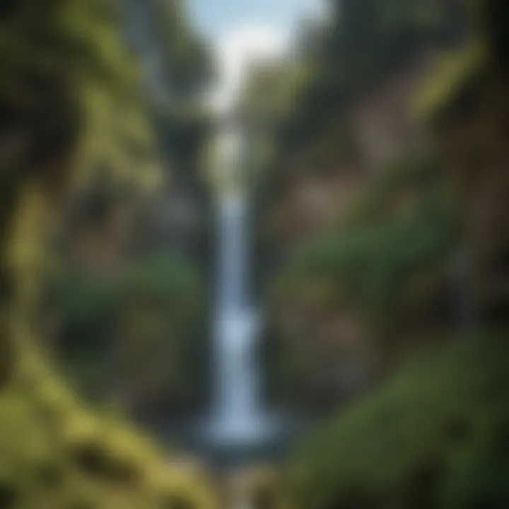 Dramatic shot of the towering Multnomah Falls in Oregon, highlighting its cascading waters against lush greenery