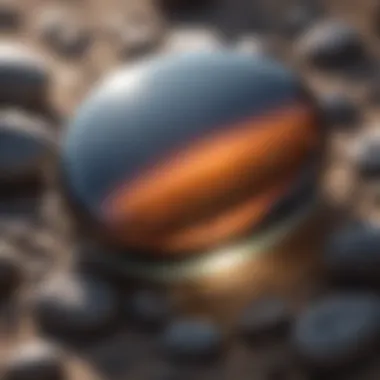 Close-up of hematite worry stone glistening under sunlight