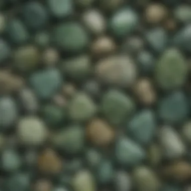 Close-up view of various opaque green stones showcasing their unique textures and colors.