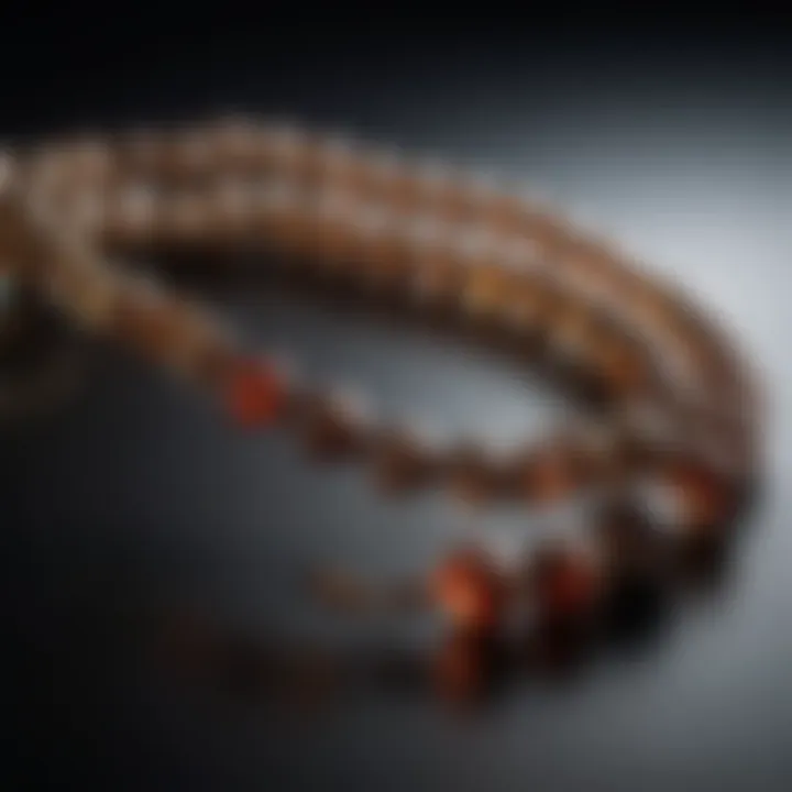 Reflection of light on the lustrous beads of a mala necklace