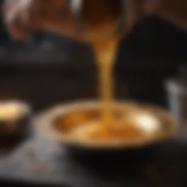 Molten gold being poured into a jewelry mold