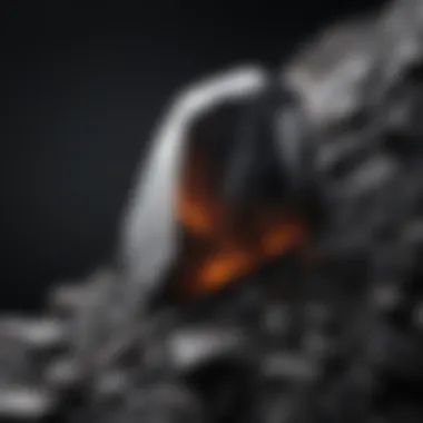 Sharp Edges and Glossy Sheen of Obsidian Obsidian displaying sharp edges and glossy sheen