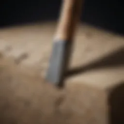 A close-up of a finely crafted stone cutting chisel