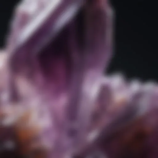 Close-up view of a raw amethyst crystal showcasing its natural facets and rich purple hue