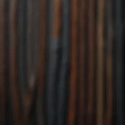 A close-up view of various necklace cords made from different materials like leather, silk, and metal.