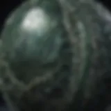 Close-up of a polished seraphinite sphere showcasing its unique patterns