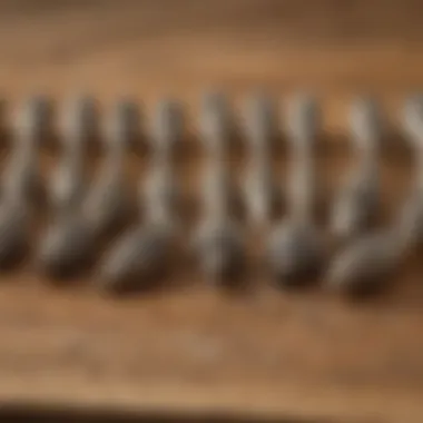A variety of wood carving Dremel bits displayed on a wooden surface