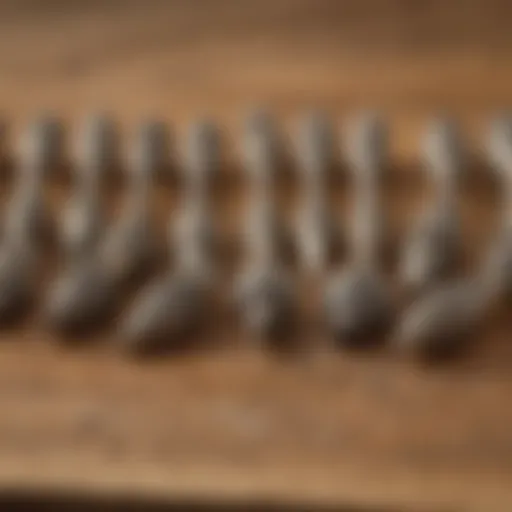 A variety of wood carving Dremel bits displayed on a wooden surface